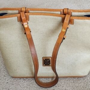 Dooney Bourke "Gretta" Medium Beige & tan leather shoulder/ tote bag.